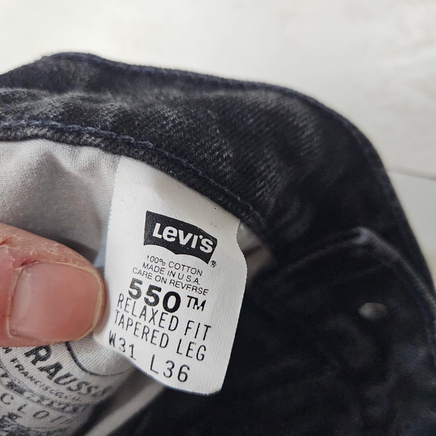1990s Levi's Black Denim 550 Relaxed Fit Tapered Leg Denim Jeans Made in USA Size 28x34.5