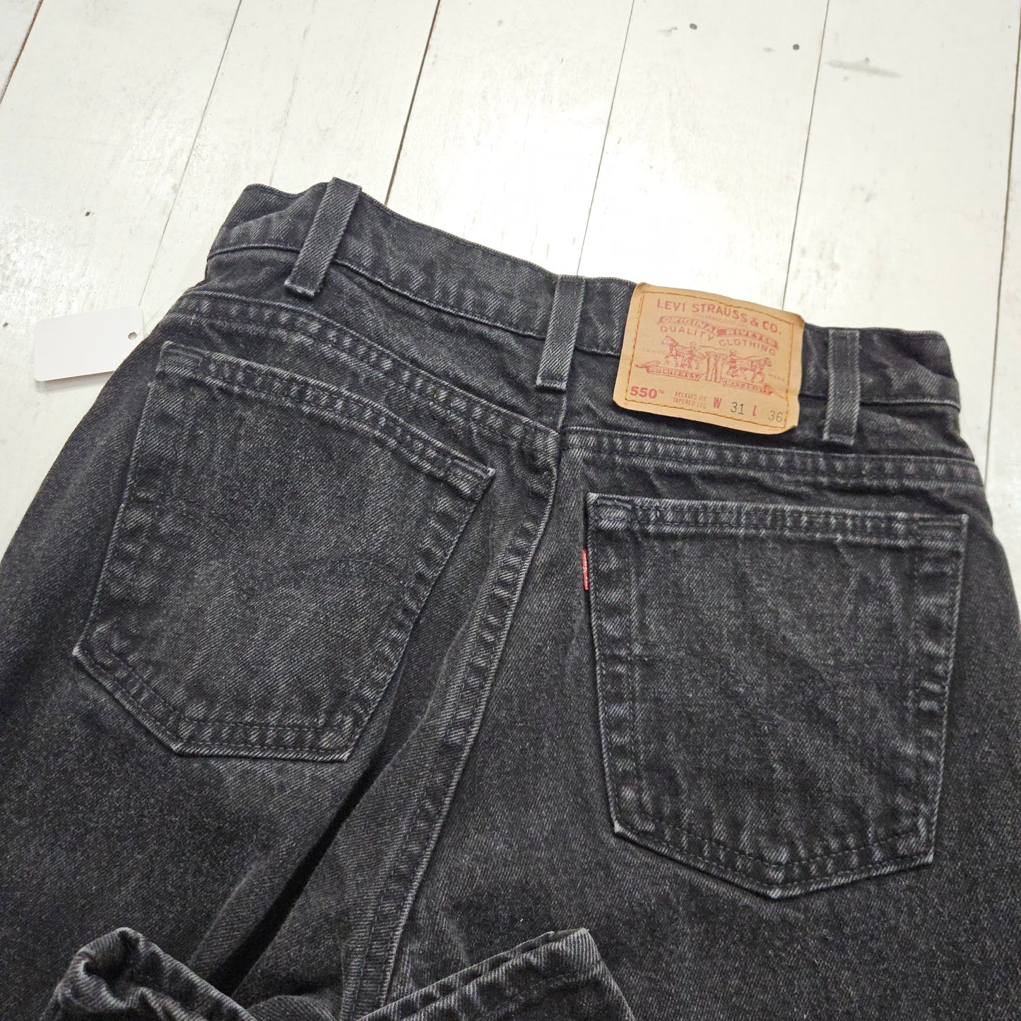 1990s Levi's Black Denim 550 Relaxed Fit Tapered Leg Denim Jeans Made in USA Size 28x34.5