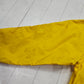 1990s Tommy Hilfiger Yellow Sleeve Spellout Windbreaker Rain Jacket Size L/XL