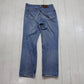 1990s Levi's Orange Tab 619 Blue Denim Jeans Distressed Painter Size 30x28